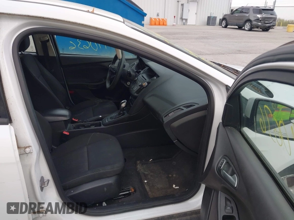2015 Ford Focus SE with VIN 1FADP3F23FL255584, listed as a IAAI auction lot 41990636 with 151,389 mi miles. Bid and sale history available at carsss.com. Image 5.