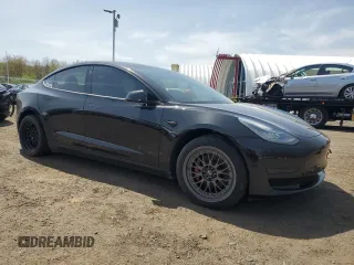 2018 Tesla Model 3 Long Range Battery with VIN 5YJ3E1EB9JF068279, listed as a Copart auction lot 54244155 with 126,279 mi miles and Clean Title. Bid and sale history available at DreamBid. Image 4.