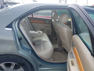 2008 Lincoln MKZ with VIN 3LNHM26T88R653977, listed as a IAAI auction lot 41922309 with 125,240 mi miles and . Bid and sale history available at carsss.com. Image 8.