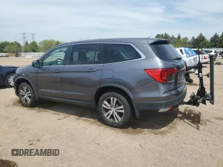 2017 Honda Pilot EX-L z VIN 5FNYF6H61HB061139, wystawiony jako Copart lot #55593095 z przebiegiem 107 170 mil mil oraz Szkoda całkowita • Salvage title. Historia ofert i sprzedaży dostępna na DreamBid. Obrazek 2.