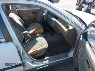 1995 Honda Civic LX z VIN JHMEG8658SS020392, wystawiony jako IAAI lot #41831805 z przebiegiem 169 028 mil mil oraz . Historia ofert i sprzedaży dostępna na DreamBid. Obrazek 5.