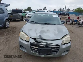 2006 Chrysler Sebring Touring z VIN 1C3AL56R66N126068, wystawiony jako IAAI lot #42210890 z przebiegiem 161 335 mil mil oraz . Historia ofert i sprzedaży dostępna na DreamBid. Obrazek 12.