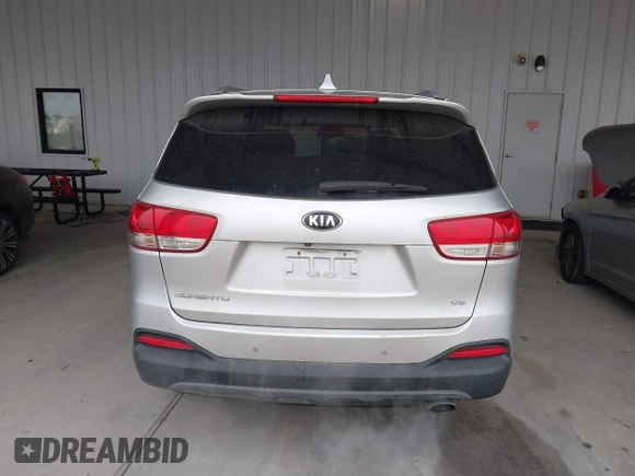 2018 Kia Sorento LX with VIN 5XYPG4A55JG360565, listed as a IAAI auction lot 41031059 with 138,963 mi miles and . Bid and sale history available at DreamBid. Image 16.