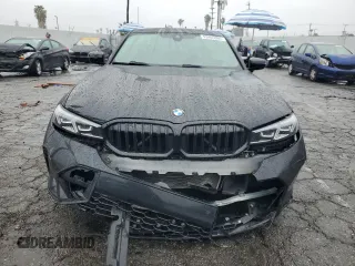 2023 BMW 3 Series 330i with VIN 3MW69FF02P8D60443, listed as a Copart auction lot 43405365 with 0 mi miles and Salvage Title. Bid and sale history available at carsss.com. Image 5.