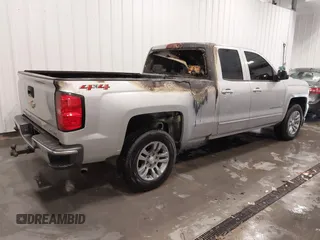 2019 Chevrolet Silverado 1500 LT with VIN 2GCVKPEC2K1105528, listed as a IAAI auction lot 41718796 with 95,999 mi miles and . Bid and sale history available at DreamBid. Image 4.