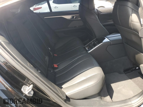 2020 BMW 8 Series M850i with VIN WBAGV8C01LCE50737, listed as a Copart auction lot 58318665 with Not provided miles and Salvage title. Bid and sale history available at DreamBid. Image 10.