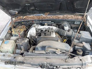 2001 Kia Sportage with VIN KNDJB723115706221, listed as a IAAI auction lot 41562713 with 99,378 mi miles. Bid and sale history available at carsss.com. Image 10.