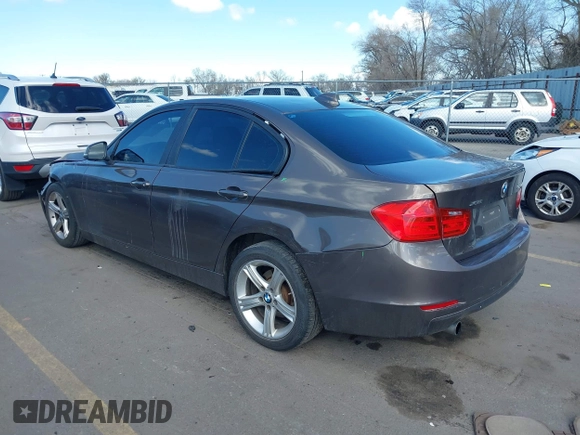 2014 BMW 3 Series 320i xDrive with VIN WBA3C3C58EF983816, listed as a IAAI auction lot 41949430 with 111,627 mi miles. Bid and sale history available at carsss.com. Image 3.