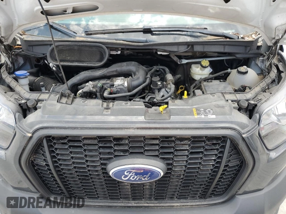 2021 Ford Transit Cargo с VIN 1FTBR1X89MKA53998, выставлен на аукционе Copart как лот 59292575 с пробегом 85 472 миль миль и Списание • Salvage title. История ставок и продаж доступна на DreamBid. Изображение 12.