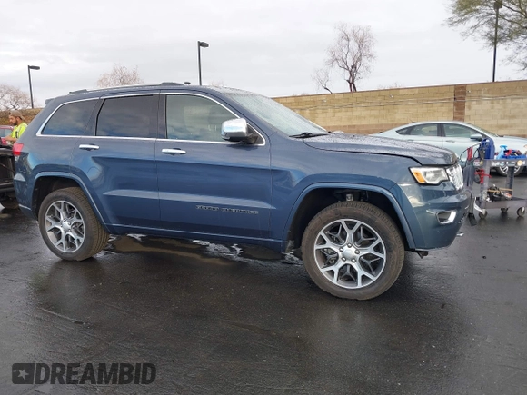 2019 Jeep Grand Cherokee Overland with VIN 1C4RJFCG6KC726690, listed as a IAAI auction lot 41421299 with 116,190 mi miles. Bid and sale history available at carsss.com. Image 14.
