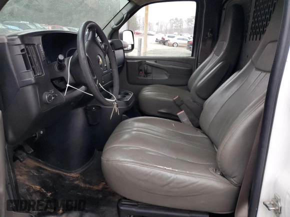 2015 Chevrolet Express Cargo with VIN 1GCWGFCF9F1276785, listed as a Copart auction lot 44939555 with 216,253 mi miles and Salvage title. Bid and sale history available at DreamBid. Image 7.