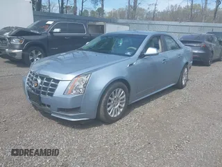 2013 Cadillac CTS Luxury with VIN 1G6DE5E58D0130850, listed as a IAAI auction lot 42085332 with 38,160 mi miles and . Bid and sale history available at DreamBid. Image 2.