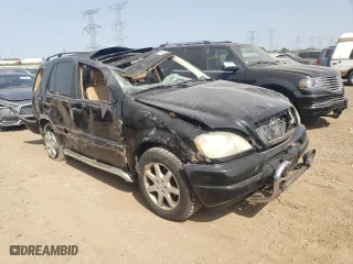 1999 Mercedes-Benz M-Class with VIN 4JGAB72E6XA058470, listed as a Copart auction lot 67783334 with 0 mi miles and Salvage Title. Bid and sale history available at carsss.com. Image 4.