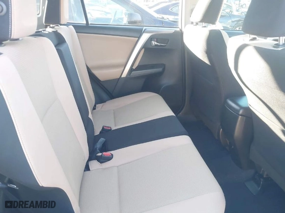 2018 Toyota RAV4 XLE with VIN JTMRFREV0JJ735636, listed as a IAAI auction lot 41658305 with 94,944 mi miles. Bid and sale history available at carsss.com. Image 8.