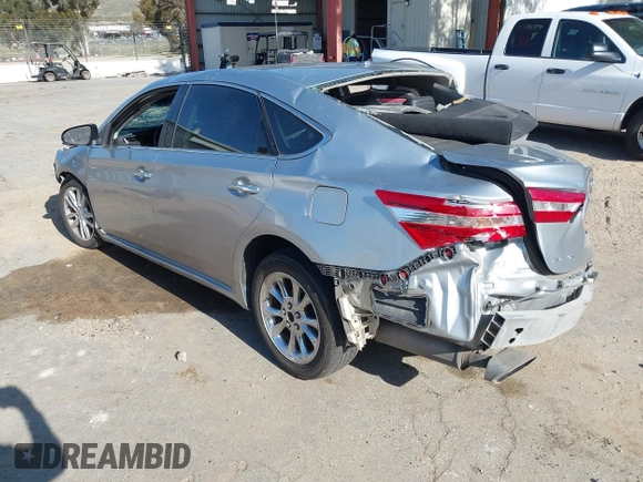 2015 Toyota Avalon Limited with VIN 4T1BK1EBXFU141061, listed as a IAAI auction lot 41943384 with Not Provided miles and . Bid and sale history available at DreamBid. Image 3.