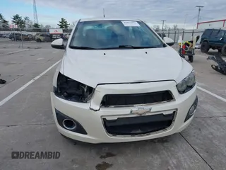 2014 Chevrolet Sonic LTZ with VIN 1G1JE5SH3E4133088, listed as a IAAI auction lot 41072056 with 143,855 mi miles. Bid and sale history available at carsss.com. Image 6.