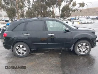 2007 Acura MDX with VIN 2HNYD28257H548844, listed as a IAAI auction lot 41469488 with 234,515 mi miles. Bid and sale history available at carsss.com. Image 12.