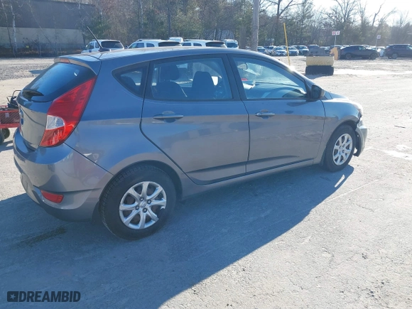 2014 Hyundai Accent GS with VIN KMHCT5AE6EU174338, listed as a IAAI auction lot 41096955 with 49,614 mi miles. Bid and sale history available at carsss.com. Image 4.
