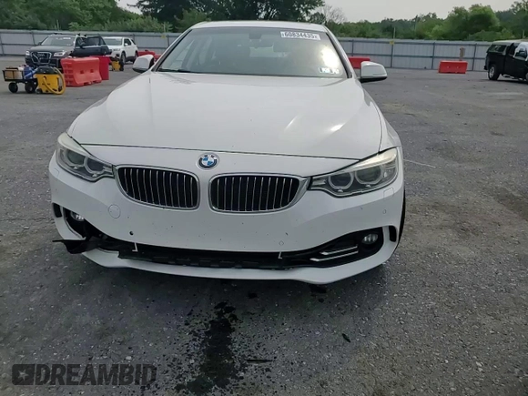 2015 BMW 4 Series 428i xDrive с VIN WBA4C9C52FD330306, выставлен на аукционе Copart как лот 60834435 с пробегом 167 034 миль миль и Списание • Salvage title. История ставок и продаж доступна на DreamBid. Изображение 13.