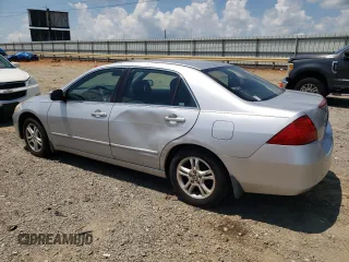 2006 Honda Accord LX SE with VIN 1HGCM56306A047940, listed as a Copart auction lot 61636365 with 197,560 mi miles and Clean title. Bid and sale history available at DreamBid. Image 2.