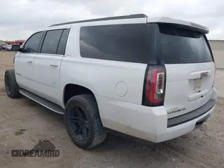 2019 GMC Yukon XL SLT with VIN 1GKS1GKC1KR384332, listed as a IAAI auction lot 41232450 with 109,219 mi miles. Bid and sale history available at carsss.com. Image 3.