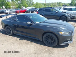 2016 Ford Mustang V6 z VIN 1FA6P8AM1G5294601, wystawiony jako IAAI lot #42336911 z przebiegiem 113 140 mil mil oraz . Historia ofert i sprzedaży dostępna na DreamBid. Obrazek 1.