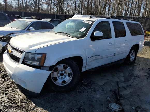 2009 Chevrolet Suburban LT w/2LT with VIN 1GNFK26319R274535, listed as a Copart auction lot 42704165 with 254,514 mi miles and Salvage Title. Bid and sale history available at carsss.com. Image 1.