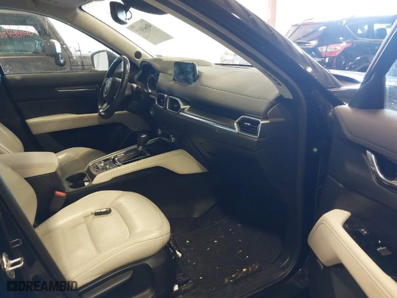 2017 Mazda CX-5 Grand Touring with VIN JM3KFBDLXH0206999, listed as a IAAI auction lot 41649611 with 73,382 mi miles. Bid and sale history available at carsss.com. Image 5.