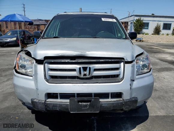 2007 Honda Pilot LX with VIN 5FNYF281X7B012081, listed as a Copart auction lot 52637735 with 142,729 mi miles and Salvage Title. Bid and sale history available at carsss.com. Image 5.