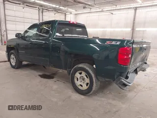 2015 Chevrolet Silverado 1500 LT with VIN 1GCVKREC2FZ147321, listed as a IAAI auction lot 41995003 with 148,053 mi miles and . Bid and sale history available at DreamBid. Image 3.
