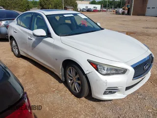 2015 Infiniti Q50 Premium with VIN JN1BV7ARXFM414391, listed as a IAAI auction lot 42245462 with 216,495 mi miles and . Bid and sale history available at DreamBid. Image 1.