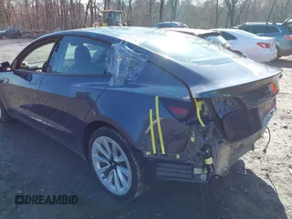 2022 Tesla Model 3 Long Range with VIN 5YJ3E1EB0NF365284, listed as a IAAI auction lot 41899706 with 36,463 mi miles and . Bid and sale history available at DreamBid. Image 3.