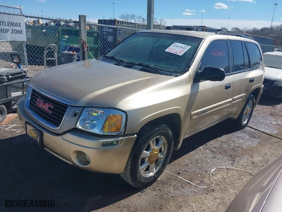 2004 GMC Envoy SLE with VIN 1GKDS13S442179334, listed as a IAAI auction lot 41693042 with 224,868 mi miles. Bid and sale history available at carsss.com. Image 2.