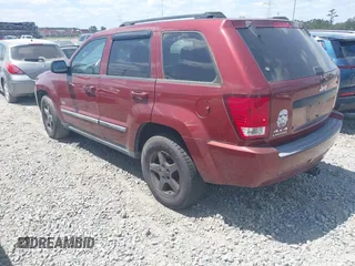 2007 Jeep Grand Cherokee Laredo with VIN 1J8GR48K57C618529, listed as a IAAI auction lot 42139566 with 174,559 mi miles. Bid and sale history available at carsss.com. Image 3.