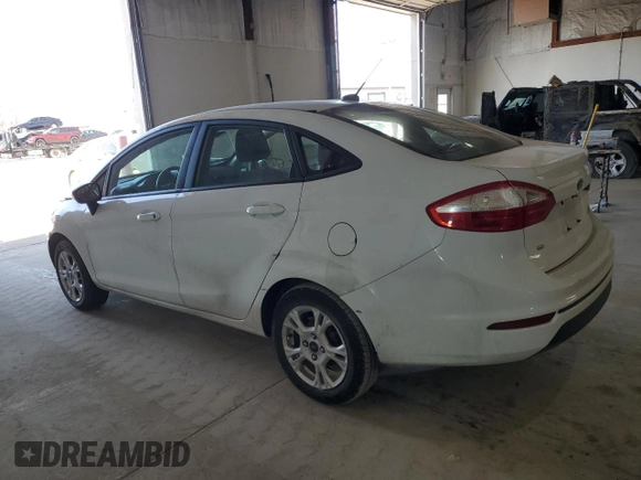 2016 Ford Fiesta SE with VIN 3FADP4BJ4GM173821, listed as a Copart auction lot 48788195 with 54,686 mi miles and Salvage Title. Bid and sale history available at DreamBid. Image 2.