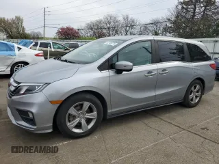 2020 Honda Odyssey EX-L with VIN 5FNRL6H77LB014535, listed as a Copart auction lot 52105275 with 112,542 mi miles and Salvage Title. Bid and sale history available at carsss.com. Image 1.