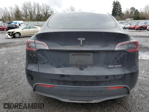 2024 Tesla Model Y Long Range with VIN 7SAYGDEE2RF131085, listed as a Copart auction lot 50171055 with Not Provided miles and Salvage Title. Bid and sale history available at DreamBid. Image 6.