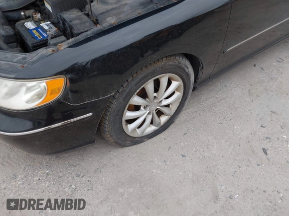2007 Hyundai Azera SE z VIN KMHFC46F67A244191, wystawiony jako IAAI lot #42273775 z przebiegiem 178 713 mil mil oraz . Historia ofert i sprzedaży dostępna na DreamBid. Obrazek 13.