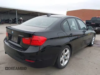 2013 BMW 3 Series 320i with VIN WBA3B1C51DK129473, listed as a IAAI auction lot 41591999 with 80,389 mi miles. Bid and sale history available at carsss.com. Image 4.