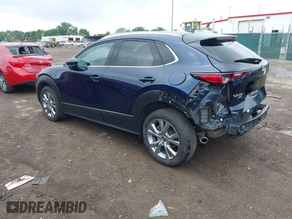 2022 Mazda CX-30 S Premium with VIN 3MVDMBDL0NM413545, listed as a IAAI auction lot 42493594 with 57,013 mi miles and . Bid and sale history available at DreamBid. Image 3.