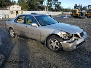 1999 Acura RL with VIN JH4KA9652XC007679, listed as a Copart auction lot 76130054 with 0 mi miles and Salvage Title. Bid and sale history available at carsss.com. Image 4.