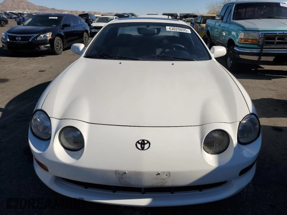 1995 Toyota Celica ST with VIN JT2AT00F9S0049936, listed as a Copart auction lot 43020895 with 208,405 mi miles and Salvage Title. Bid and sale history available at carsss.com. Image 5.
