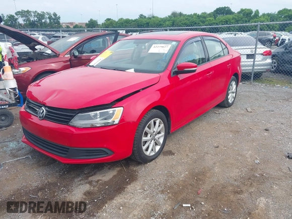 2012 Volkswagen Jetta SE with VIN 3VWDX7AJ0CM322455, listed as a IAAI auction lot 42279027 with 121,214 mi miles and . Bid and sale history available at DreamBid. Image 2.