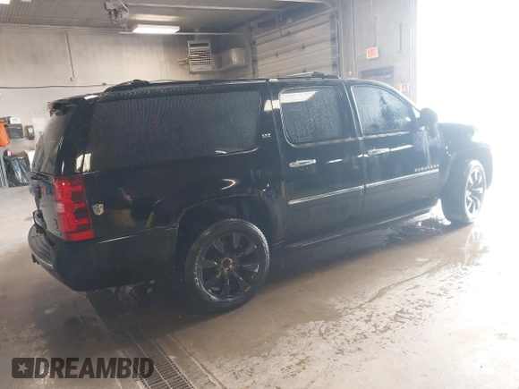 2010 Chevrolet Suburban LTZ with VIN 1GNUKKE39AR106851, listed as a IAAI auction lot 41994155 with 148,776 mi miles. Bid and sale history available at carsss.com. Image 4.