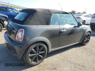 2014 MINI Convertible S с VIN WMWZP3C52ET706661, выставлен на аукционе Copart как лот 70040934 с пробегом 65 484 миль миль и Списание • Salvage title. История ставок и продаж доступна на DreamBid. Изображение 3.