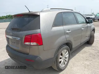 2011 Kia Sorento EX with VIN 5XYKU3A14BG100573, listed as a IAAI auction lot 42084108 with 245,187 mi miles. Bid and sale history available at carsss.com. Image 4.
