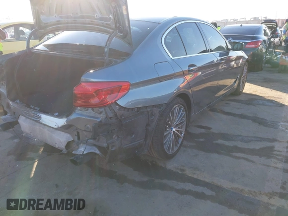 2017 BMW 5 Series 530i with VIN WBAJA5C35HG894968, listed as a IAAI auction lot 41060221 with 119,435 mi miles and . Bid and sale history available at DreamBid. Image 4.
