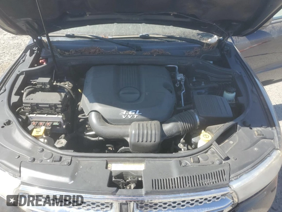 2013 Dodge Durango SXT with VIN 1C4RDHAG9DC584277, listed as a Copart auction lot 65748345 with 163,056 mi miles and Clean title. Bid and sale history available at DreamBid. Image 12.