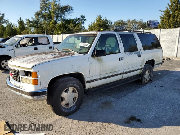 1999 GMC Suburban z VIN 3GKFK16RXXG503321, wystawiony jako Copart lot #77568614 z przebiegiem Nie podano mil oraz Czysty tytuł • Clean title. Historia ofert i sprzedaży dostępna na DreamBid. Obrazek 1.