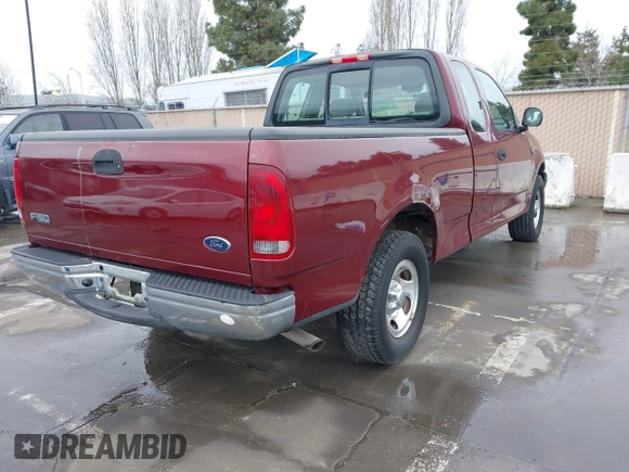 2003 Ford F-150 XL with VIN 1FTRX172X3NA92032, listed as a IAAI auction lot 41725879 with 1 mi miles. Bid and sale history available at carsss.com. Image 4.